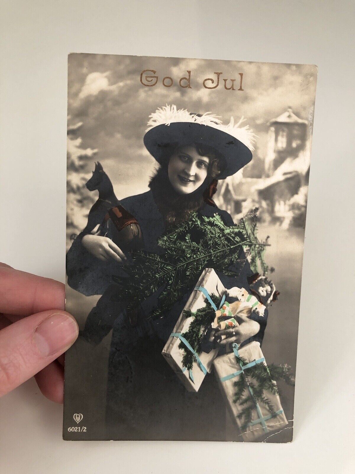 Early 1900s RPPC God Jul Woman In Fancy Hat With Toy Horse, Doll, Gifts, Painted