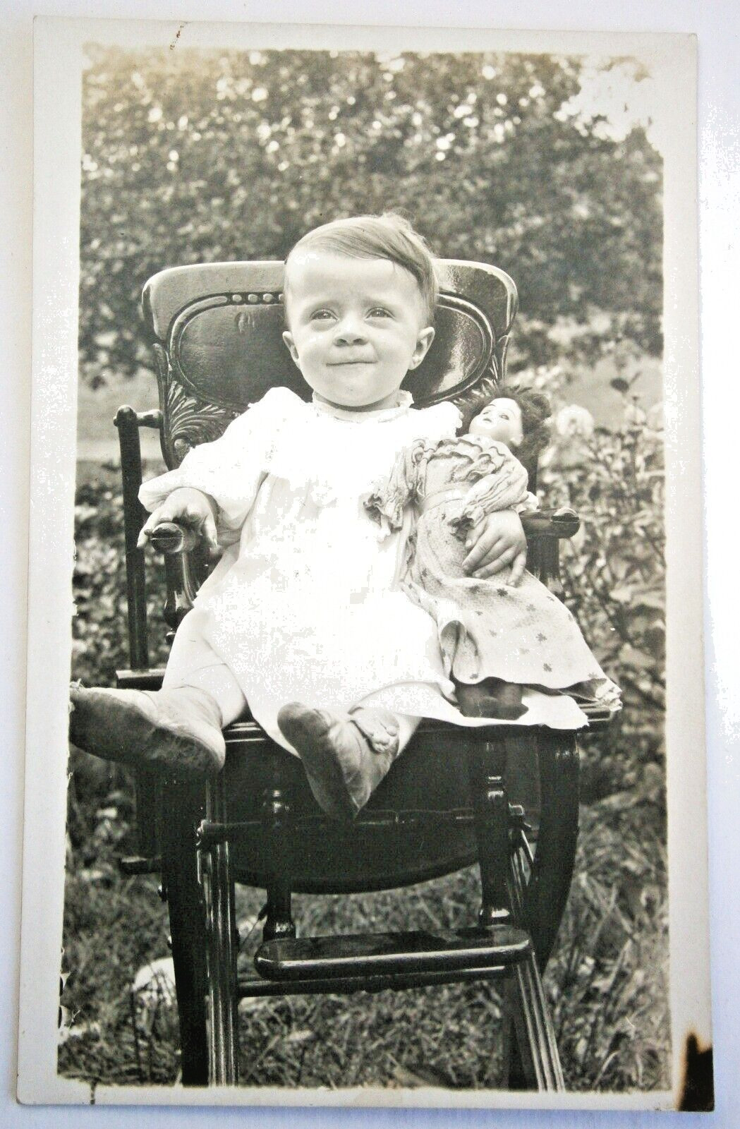 218. Real Photo Postcard of Young Girl with Her Doll from the Early 1900's