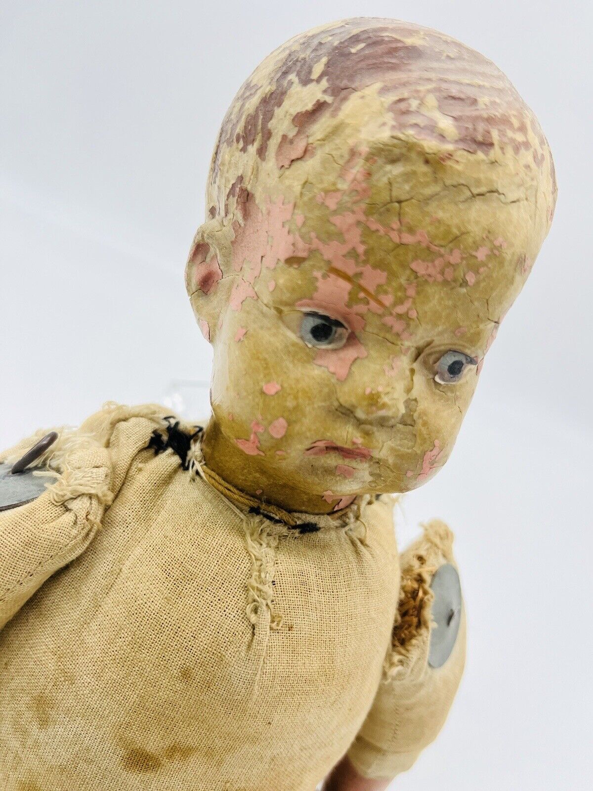 Antique Composition Doll with Molded Hair and Wooden Cradle Early 1900s