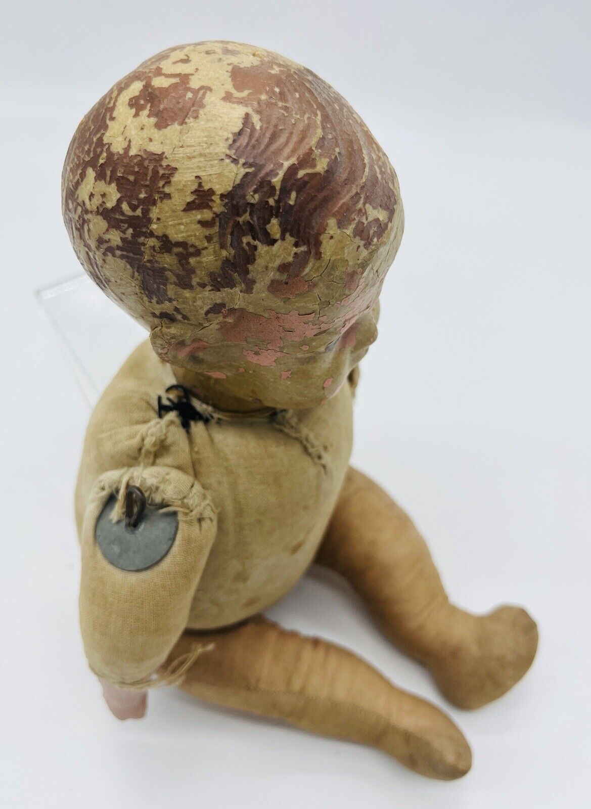Antique Composition Doll with Molded Hair and Wooden Cradle Early 1900s