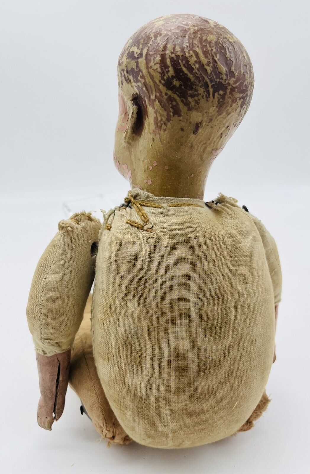 Antique Composition Doll with Molded Hair and Wooden Cradle Early 1900s