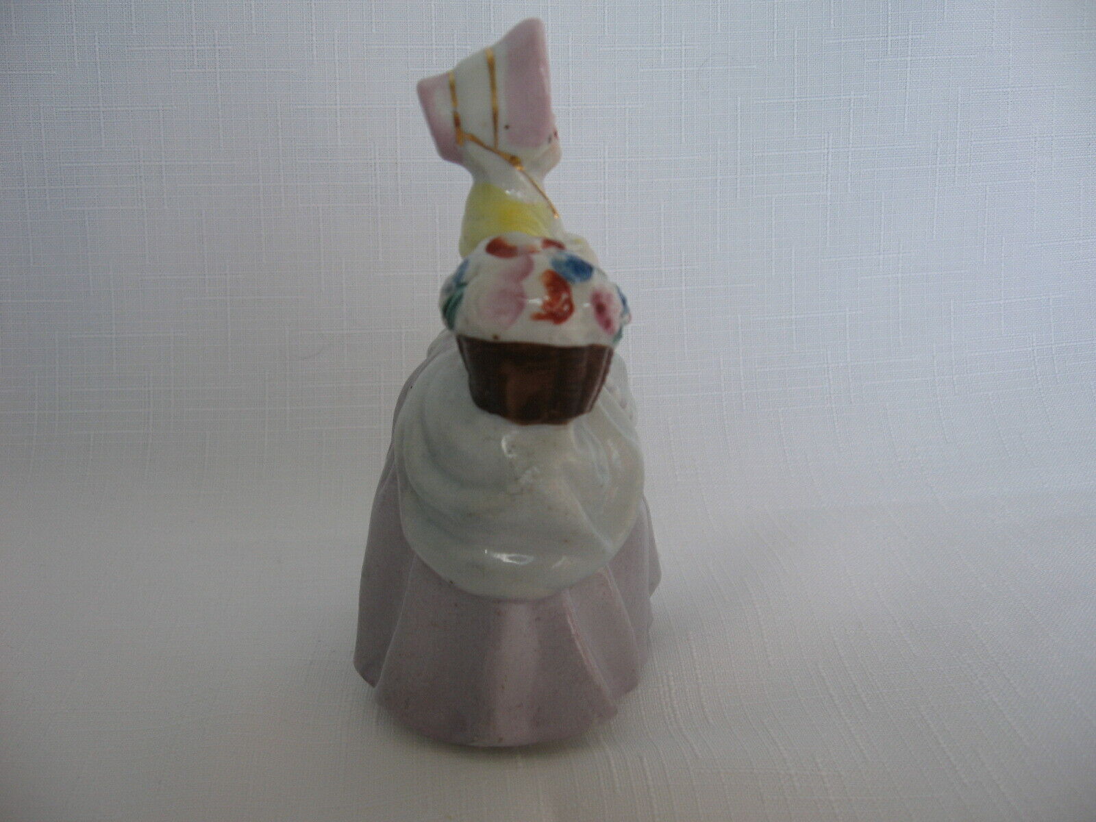 Small Made in Occupied Japan figurine 1700s woman bonnet basket flowers