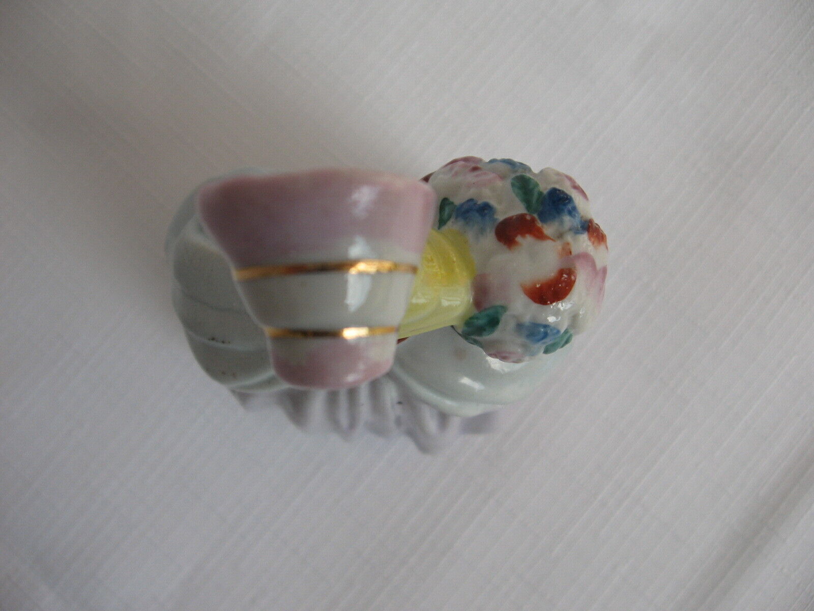 Small Made in Occupied Japan figurine 1700s woman bonnet basket flowers