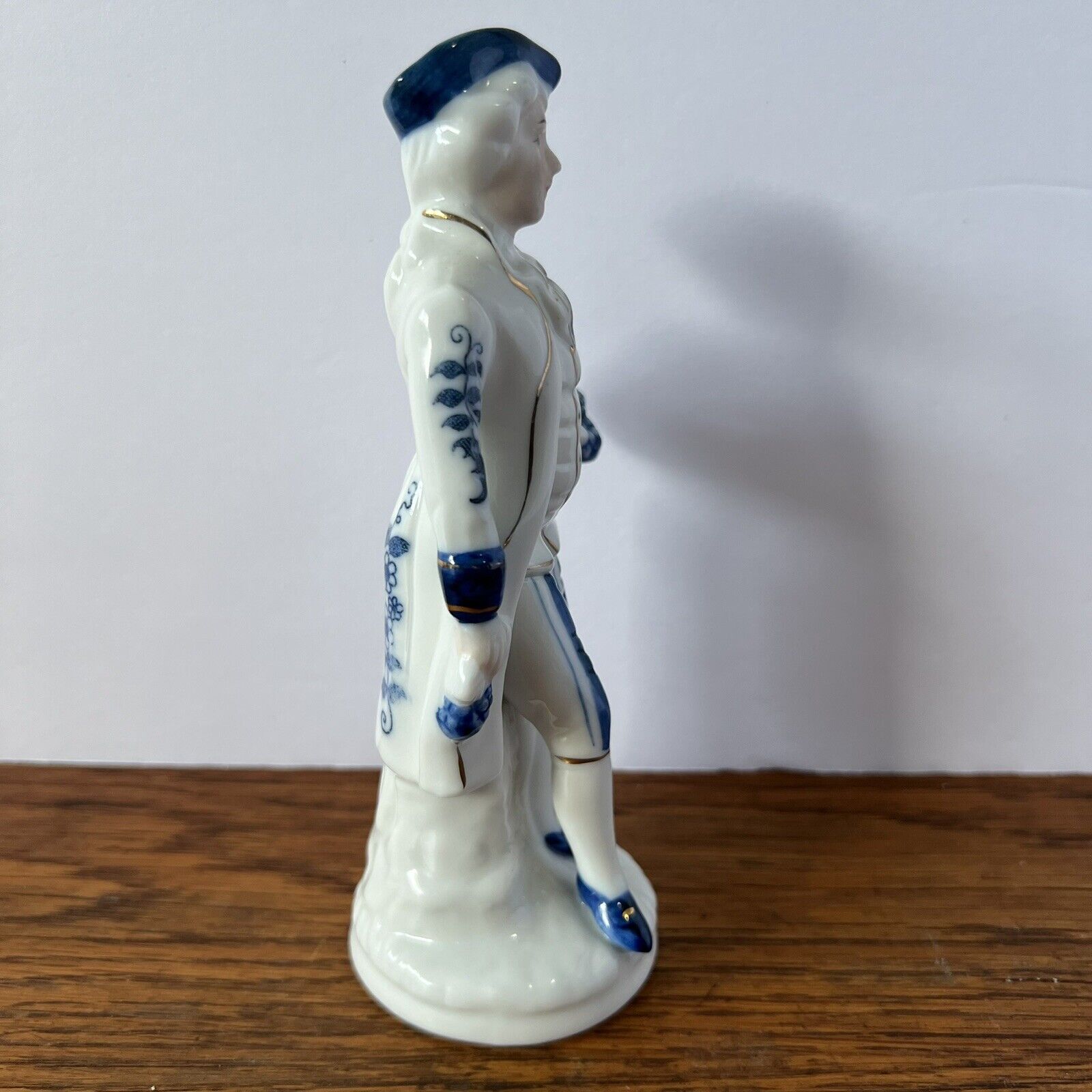 Porcelain Figure Blue and White Man with grapes, tricorne hat and 1700s garb