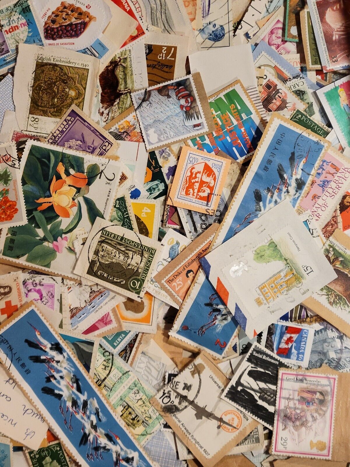 Stamps 200+ Non-US Mostly Different 1900's-Current On Paper