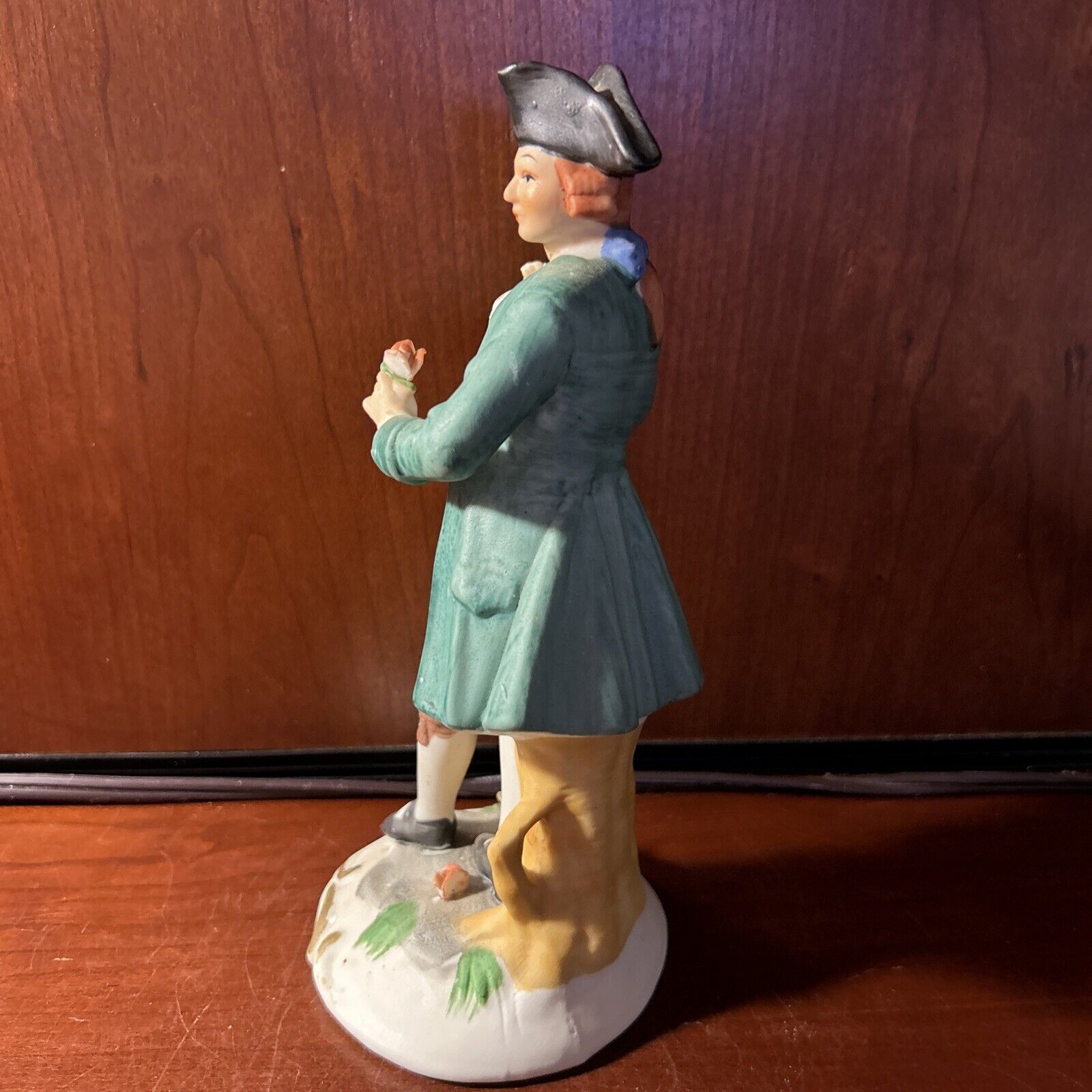 Ceramic Male Figurine In 1700s Attire Holding A Flower