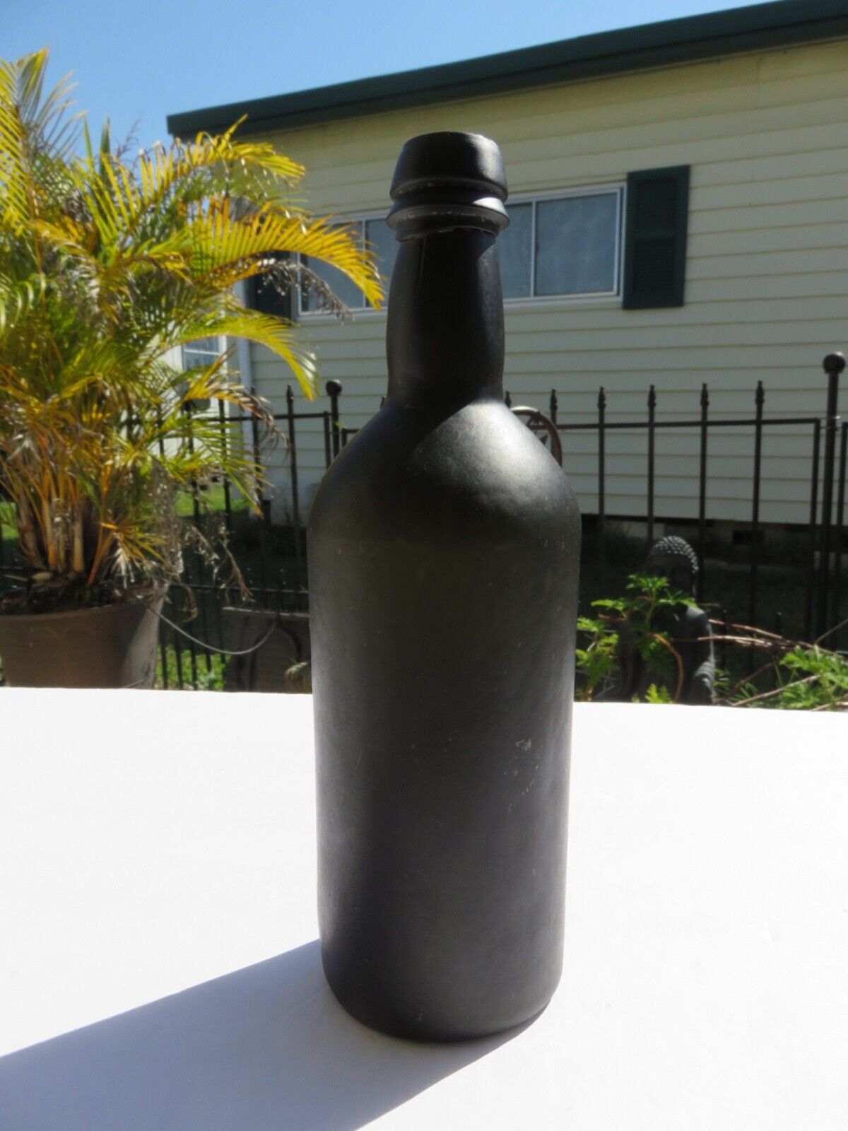 1800’s Dark Olive Green, 3 Seam, Applied Lip, 1.5” deep Bottom, 10.5” Bottle