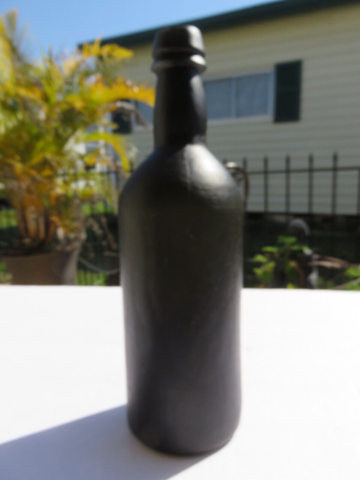 1800’s Dark Olive Green, 3 Seam, Applied Lip, 1.5” deep Bottom, 10.5” Bottle