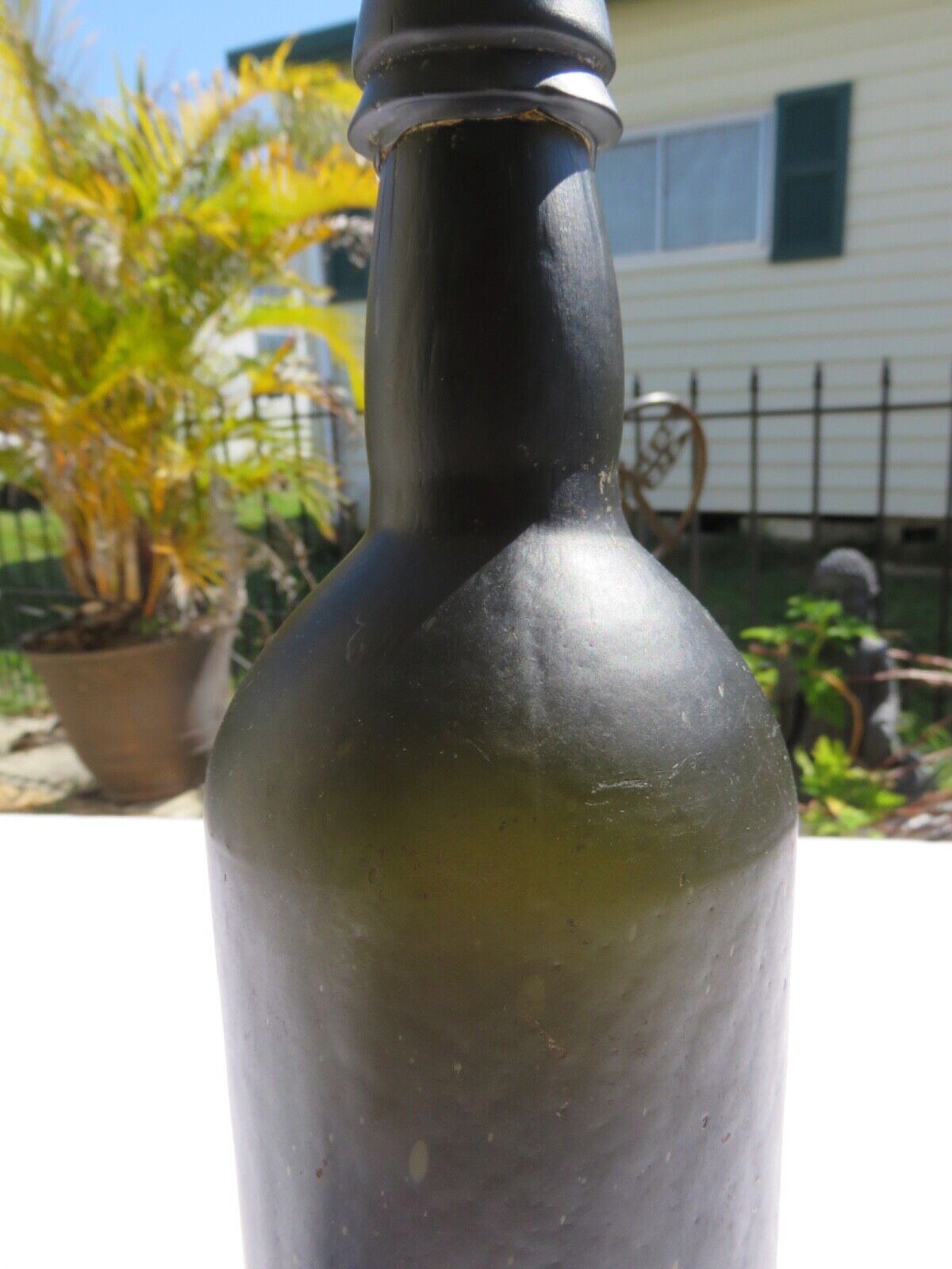 1800’s Dark Olive Green, 3 Seam, Applied Lip, 1.5” deep Bottom, 10.5” Bottle
