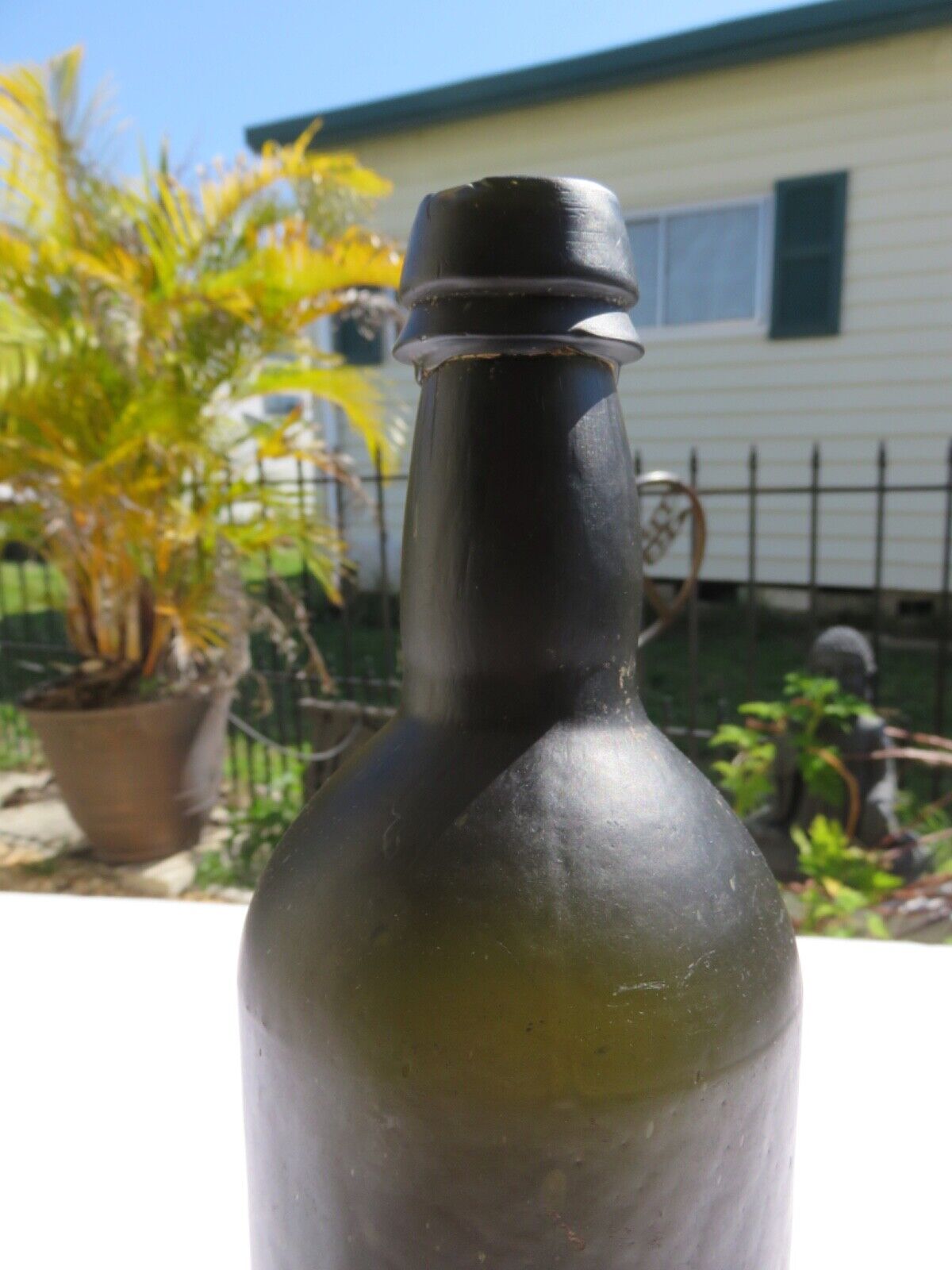 1800’s Dark Olive Green, 3 Seam, Applied Lip, 1.5” deep Bottom, 10.5” Bottle