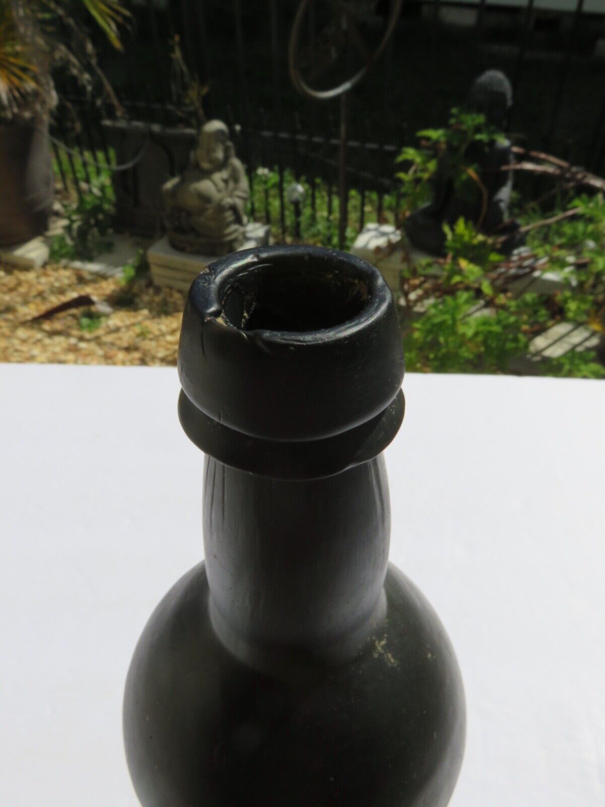 1800’s Dark Olive Green, 3 Seam, Applied Lip, 1.5” deep Bottom, 10.5” Bottle