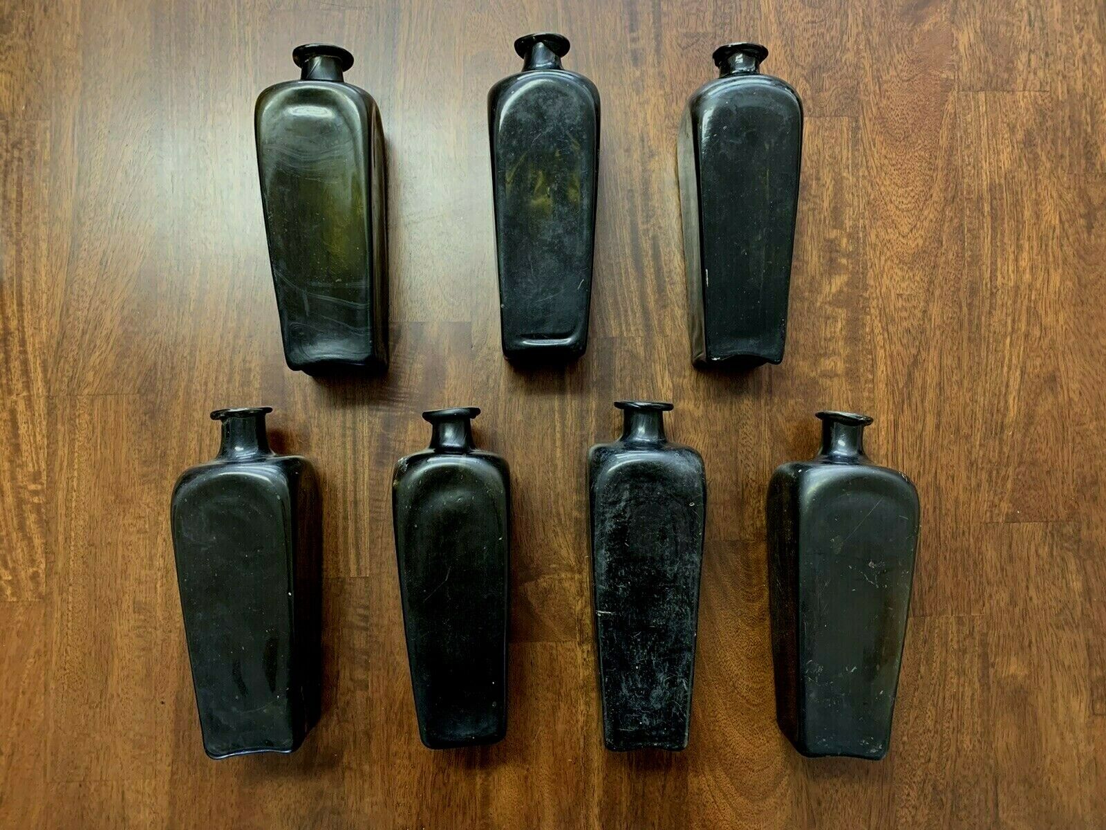 STUNNING SET OF 7 1700s AUTHENTIC HAND BLOWN GLASS "CASE GIN" BOTTLES
