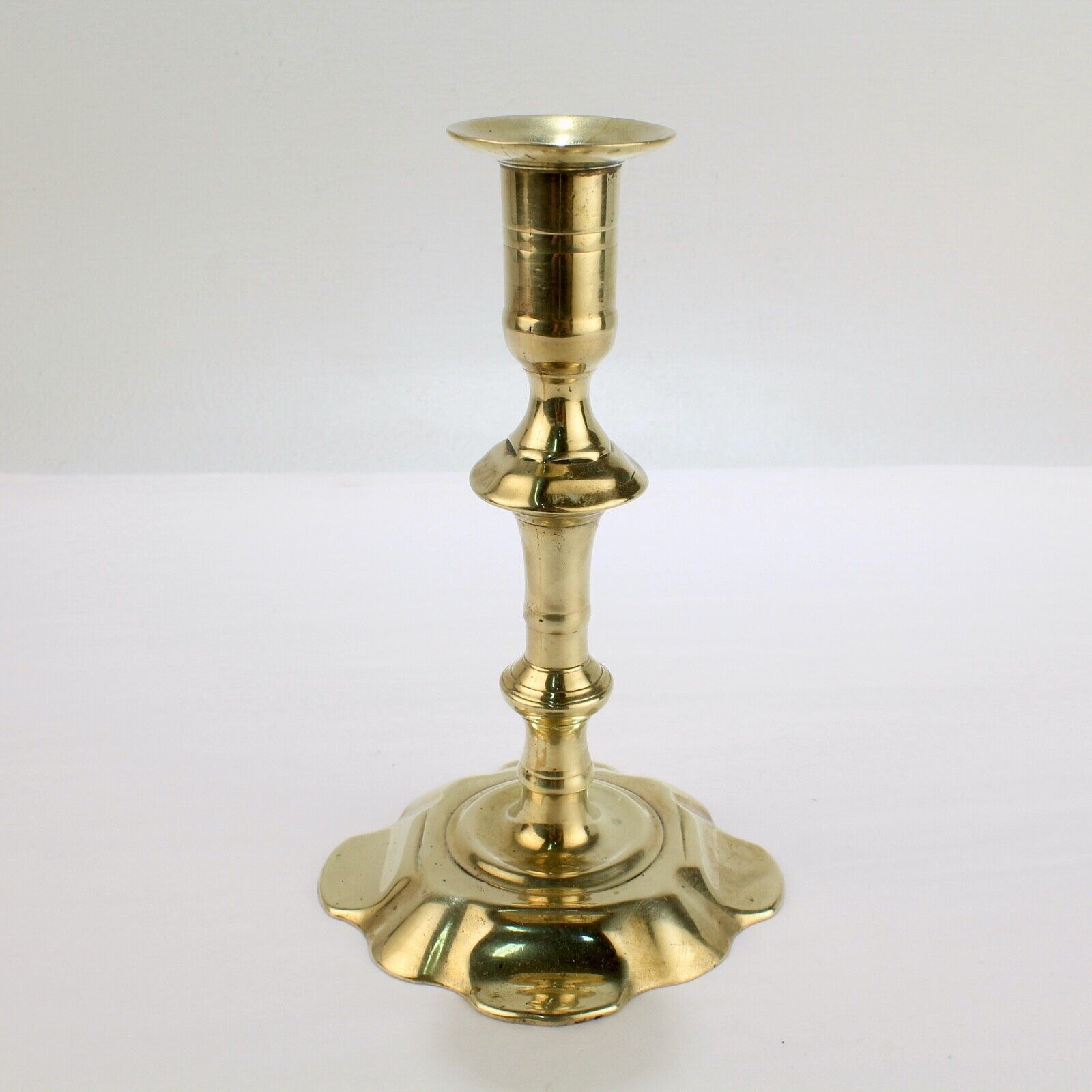 Antique 18th Century George II English Brass Petal Base Single Candlestick