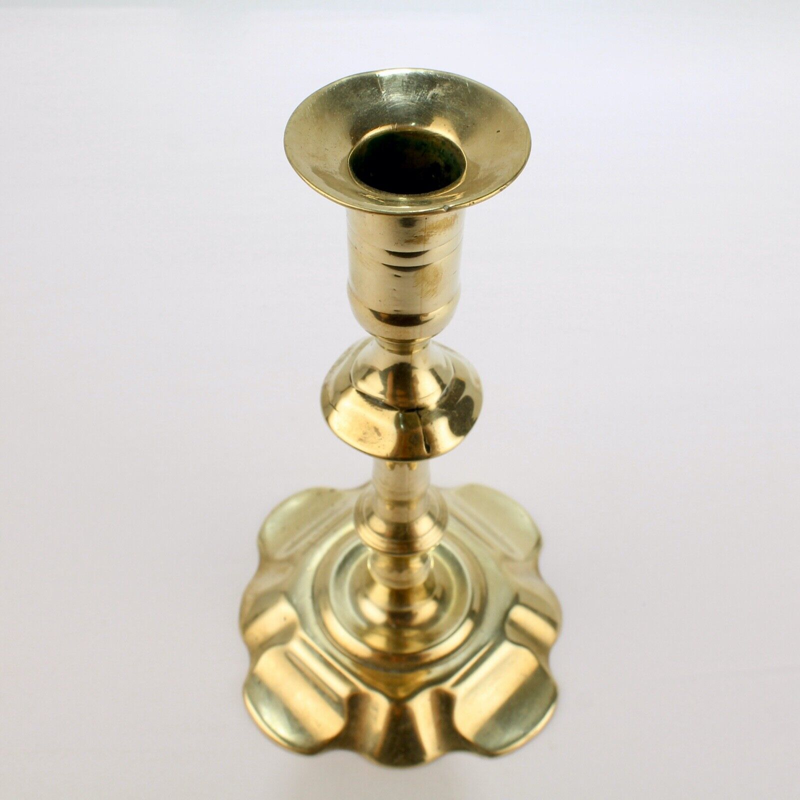 Antique 18th Century George II English Brass Petal Base Single Candlestick