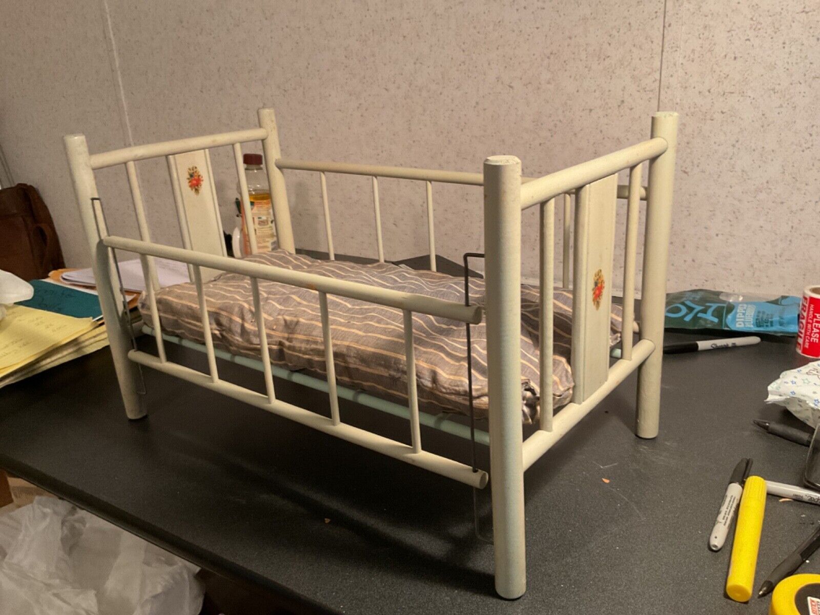 vintage baby doll crib with slide rail and feather mattress, early 1900's