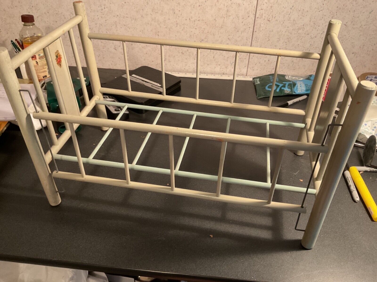 vintage baby doll crib with slide rail and feather mattress, early 1900's