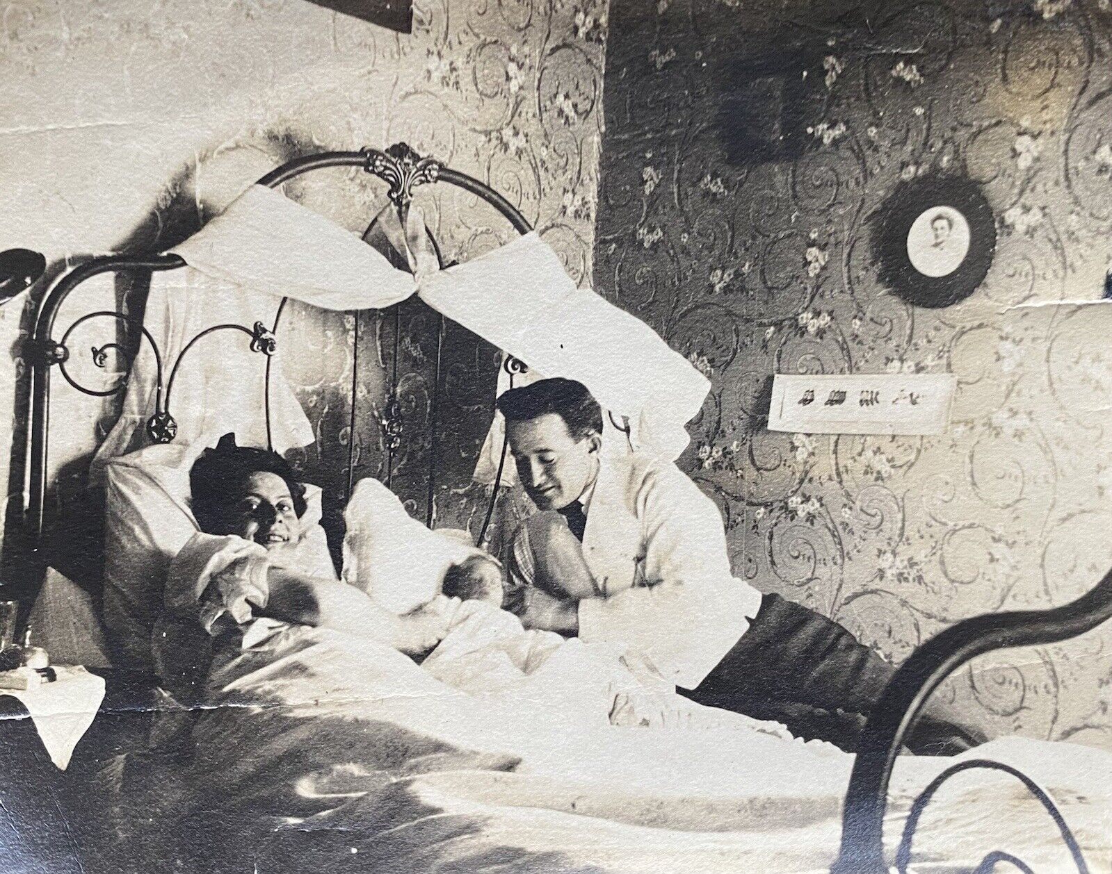 Couple in Bed with Baby Interior Bedroom Early 1900's Antique Vintage Photo