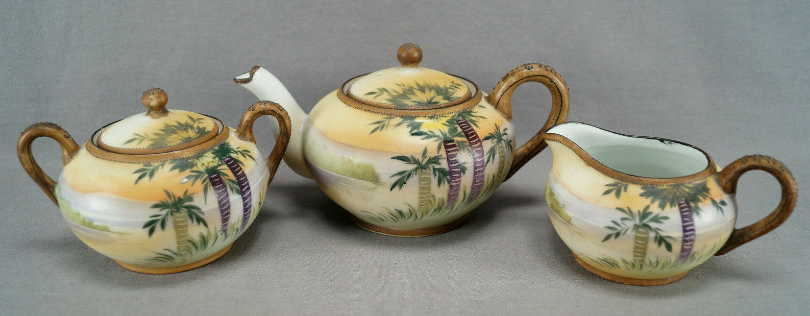 Nippon Hand Painted Enamel Teapot and Creamer Set