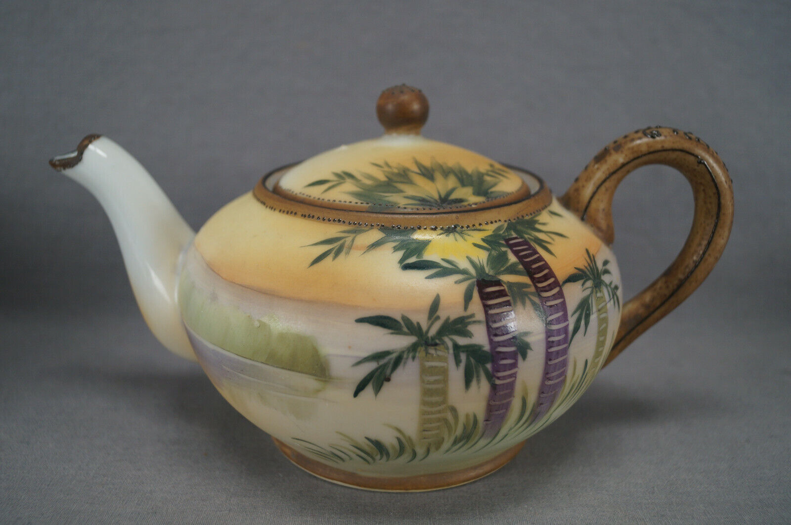 Nippon Hand Painted Enamel Teapot and Creamer Set