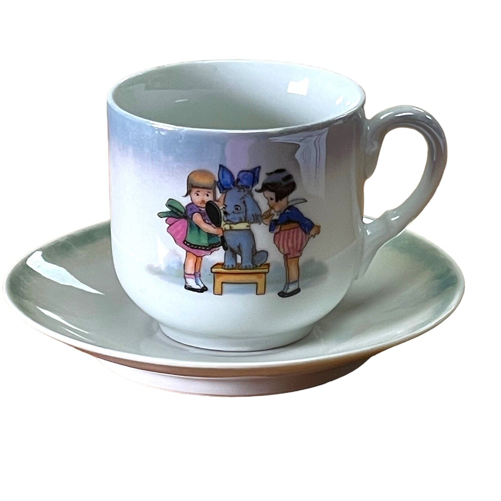 Antique Child's Cup Saucer with Dog Design