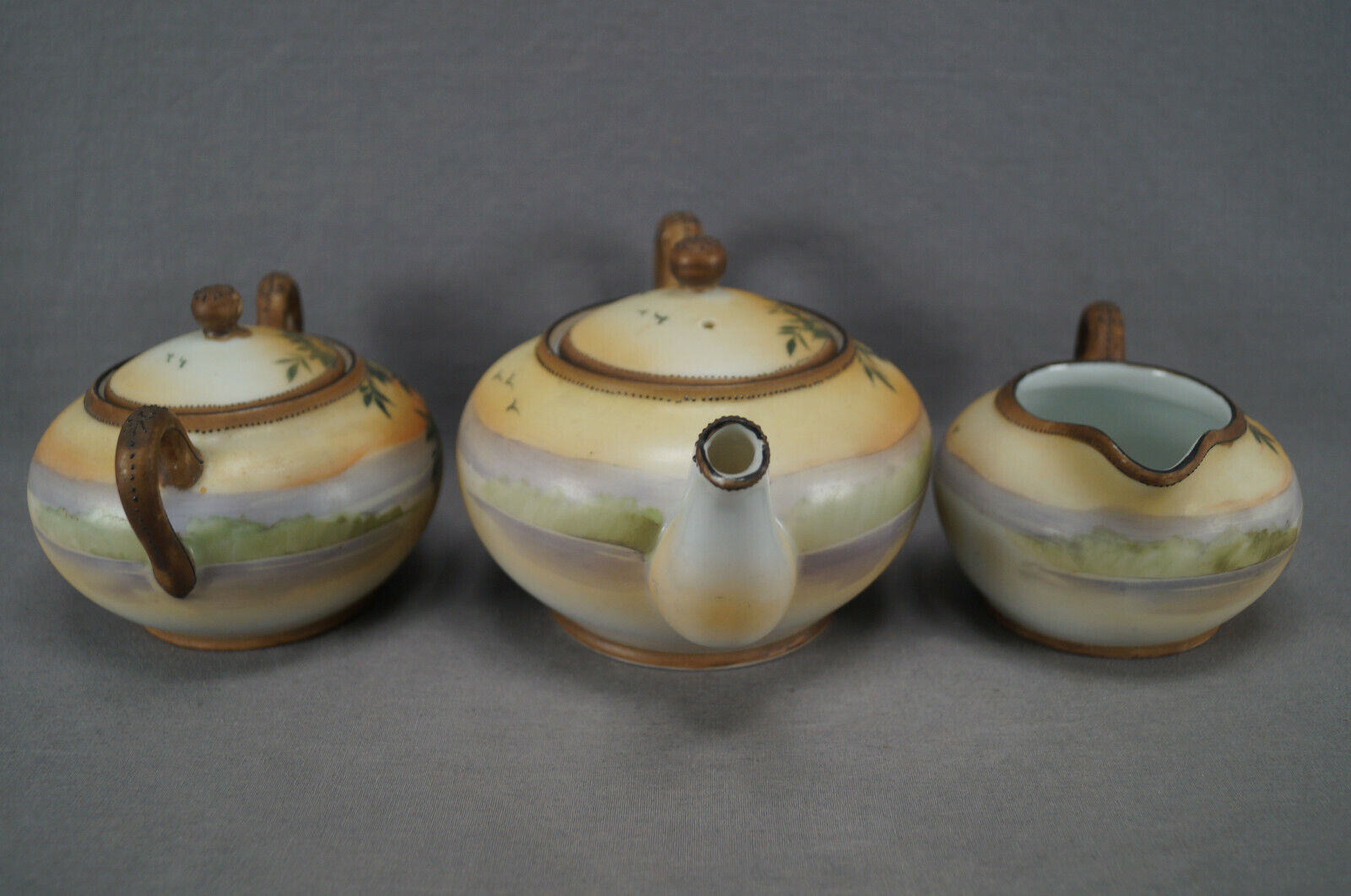 Nippon Hand Painted Enamel Teapot and Creamer Set
