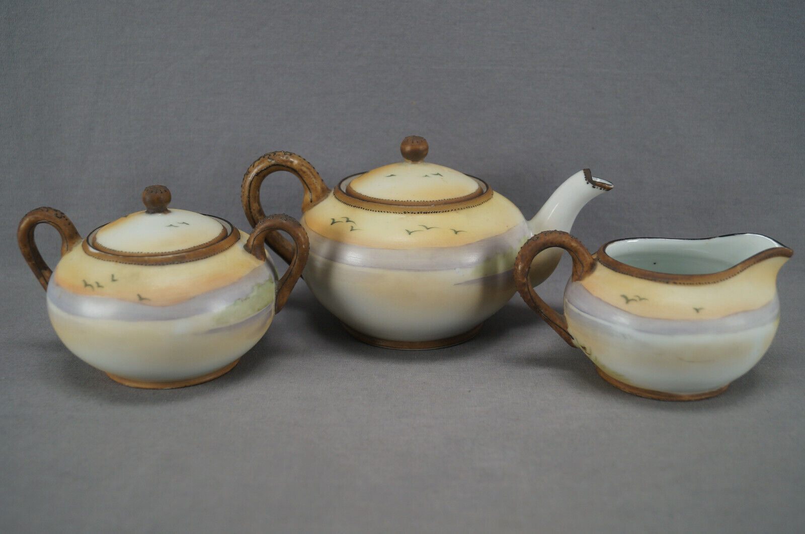 Nippon Hand Painted Enamel Teapot and Creamer Set