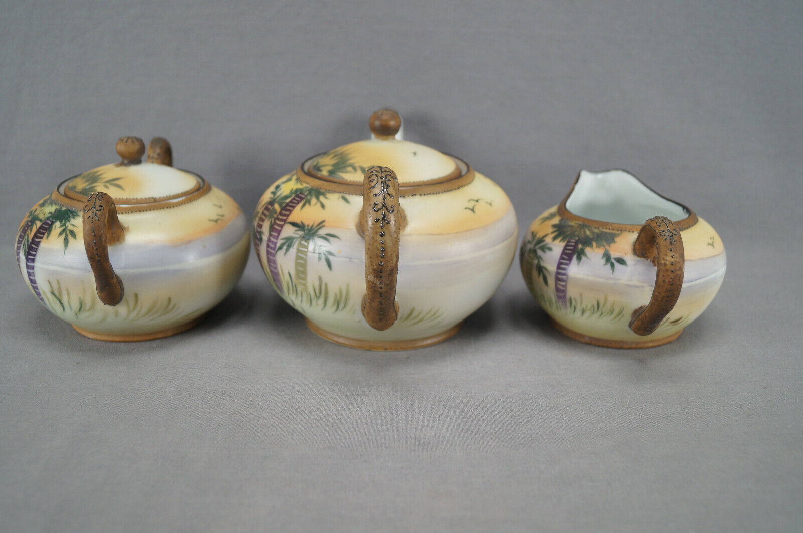Nippon Hand Painted Enamel Teapot and Creamer Set