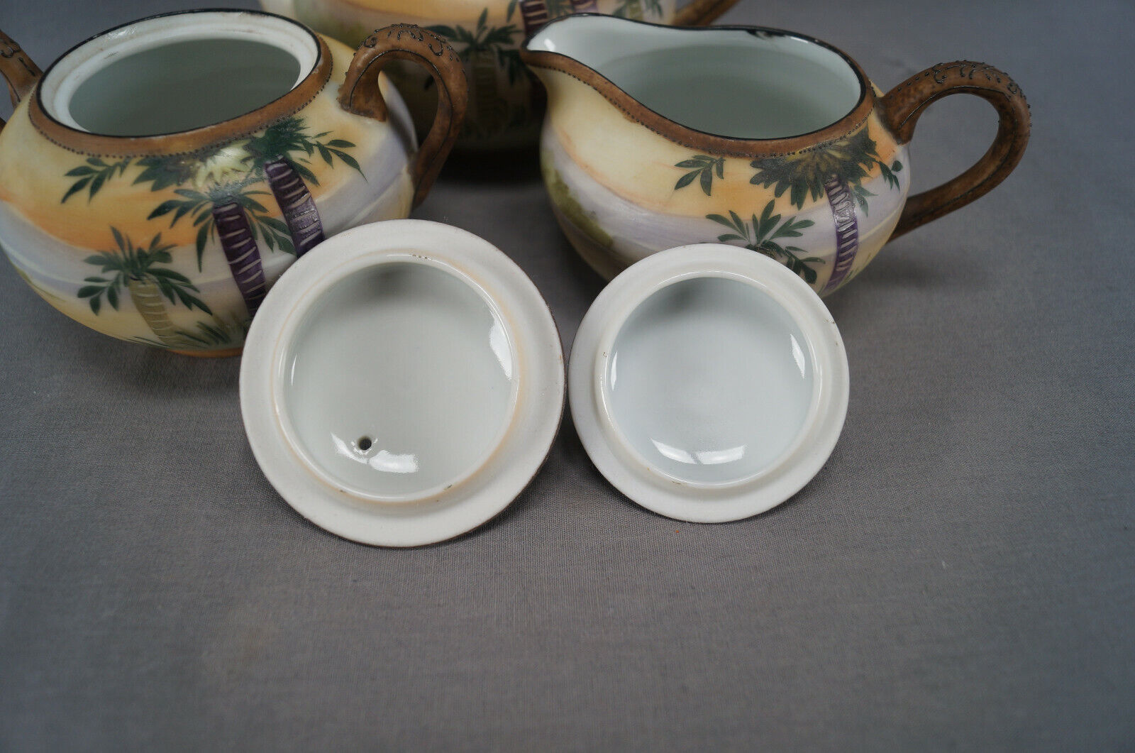 Nippon Hand Painted Enamel Teapot and Creamer Set
