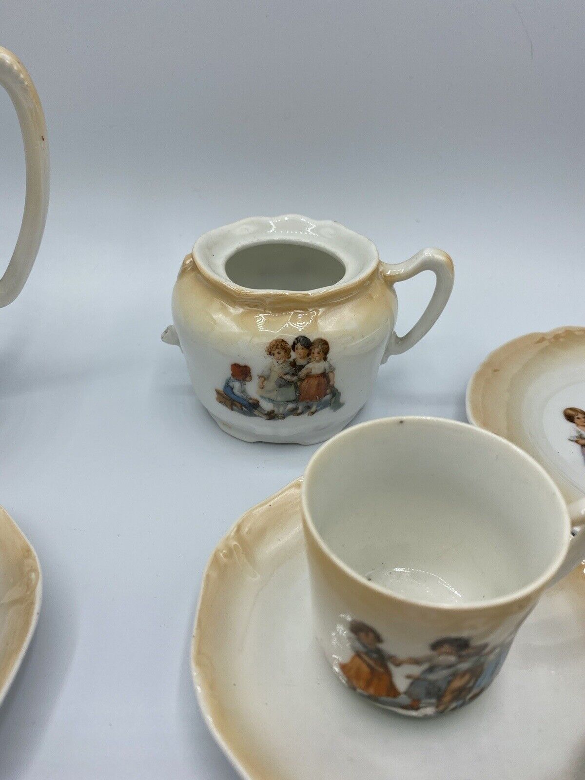 14-Piece Antique German Child's Two-Tone Tea Set