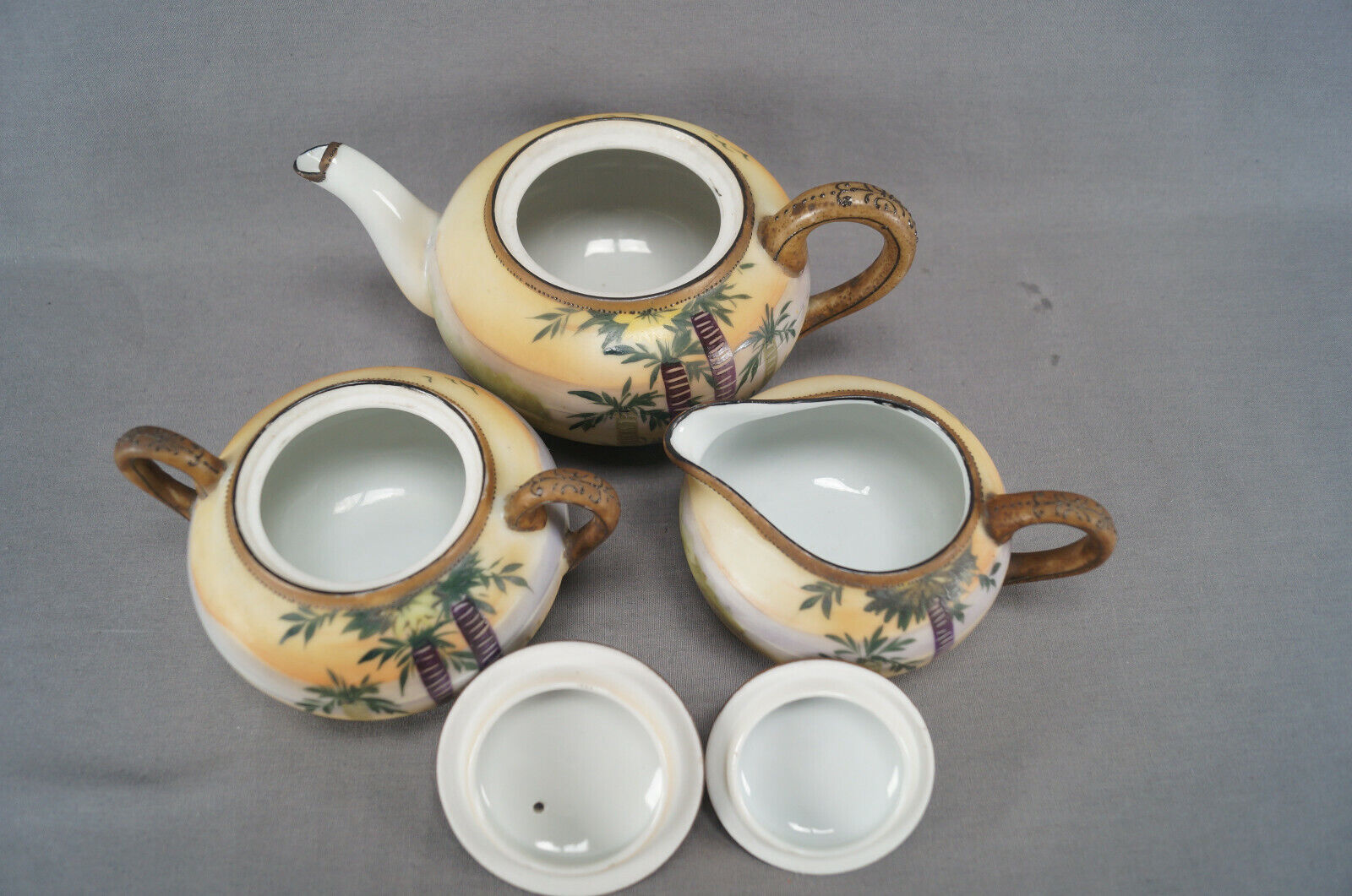 Nippon Hand Painted Enamel Teapot and Creamer Set