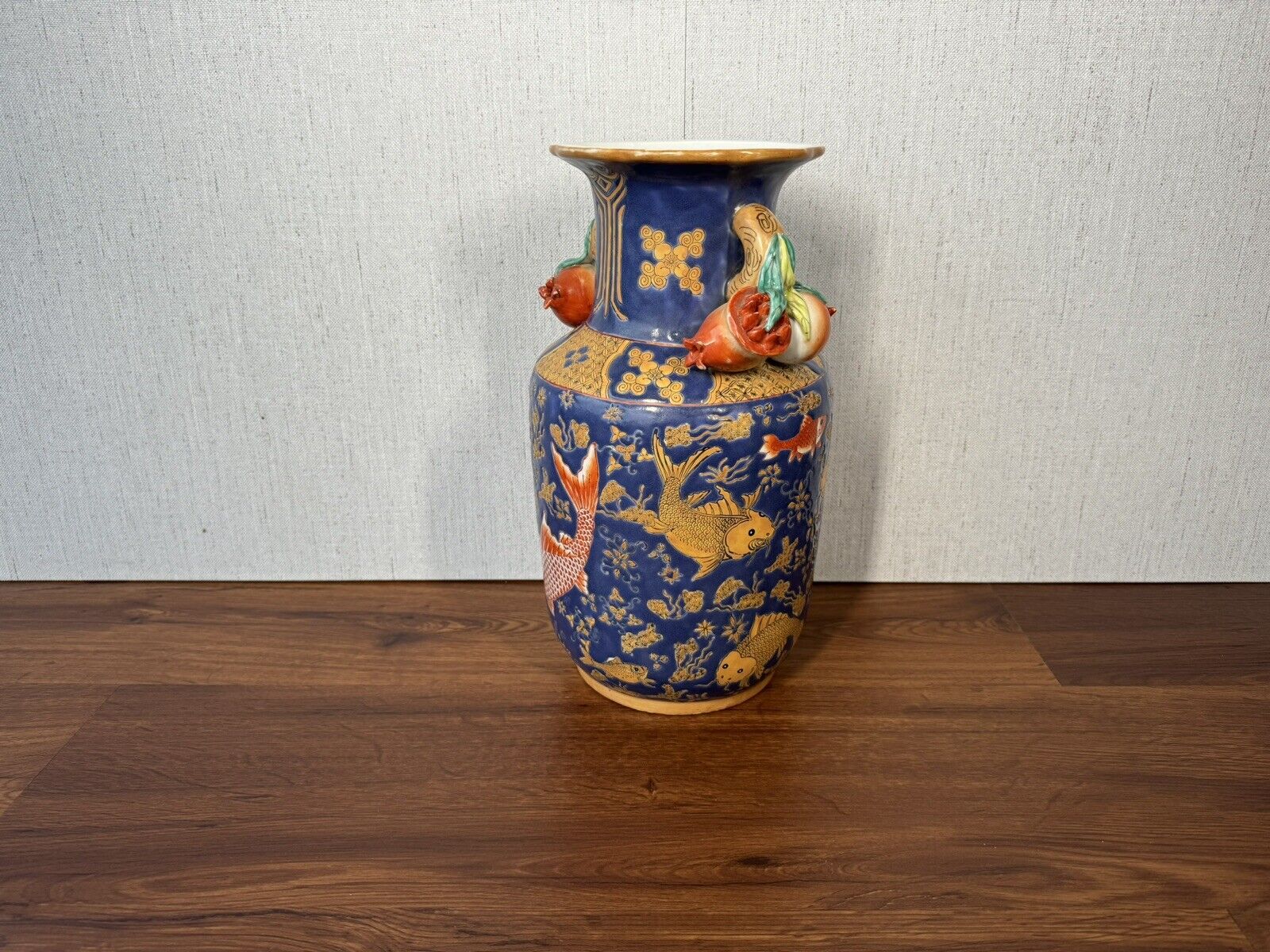 Qing Dynasty Porcelain Vase with Pomegranates and Fish