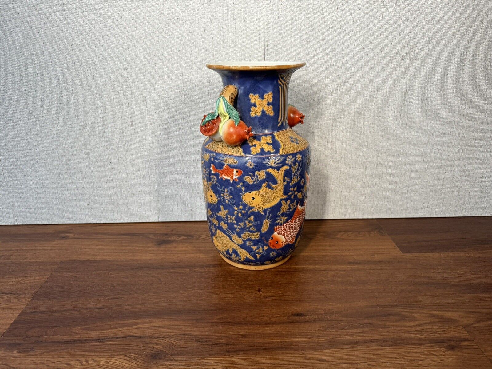 Qing Dynasty Porcelain Vase with Pomegranates and Fish