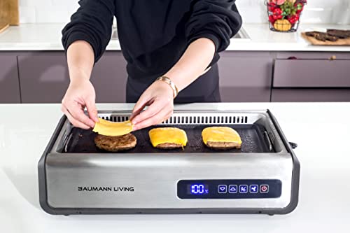Baumann Living Indoor Smokeless Grill 1500W with Smart LED Touch Screen, Tempered Glass Lid, 2 Removable Ceramic Nonstick Grill & Griddle Plate, in a Modern Stainless Steel Design.