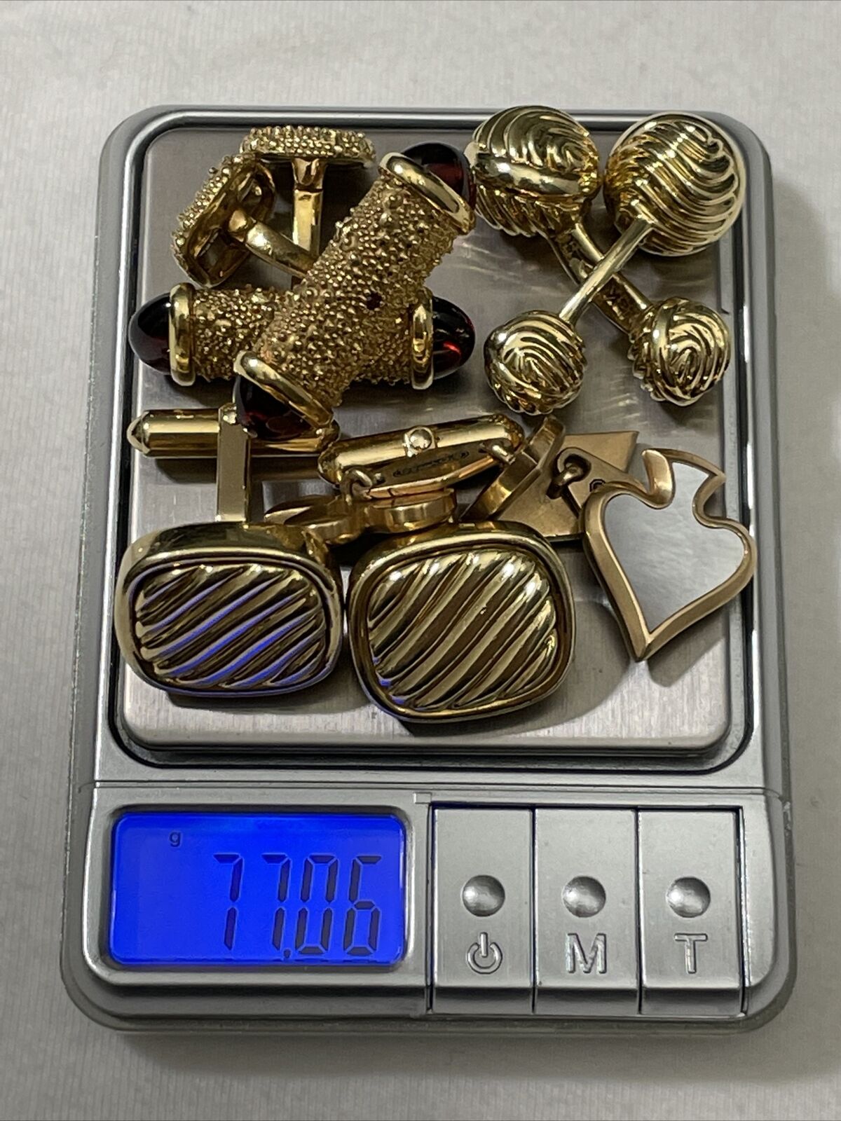 David yurman cufflinks,shirtlinks,tie clips,money clips,bracelets,belt buckle.