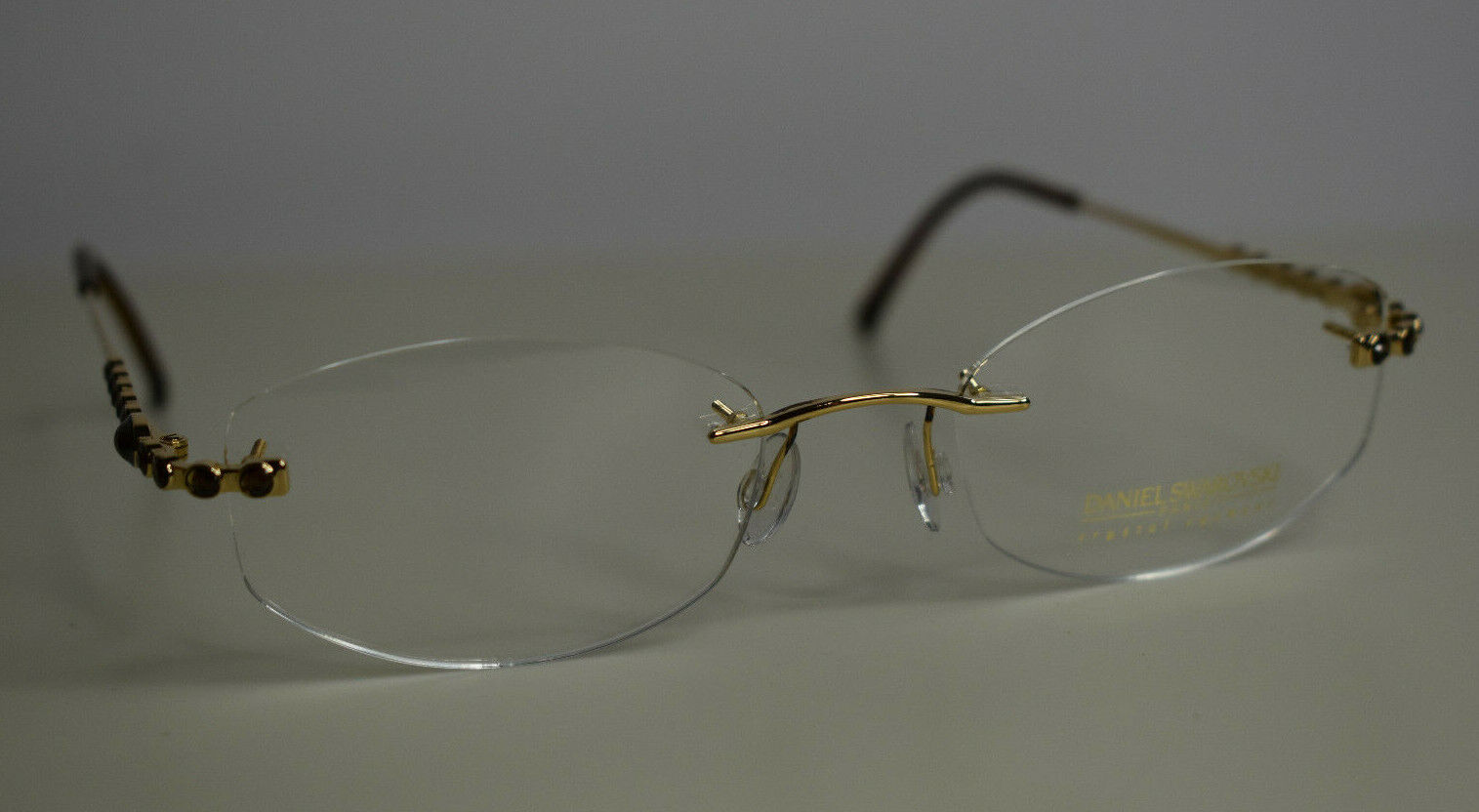 New Daniel Swarovski 23 KT Gold Plated Crystal Eyewear Rimless Brown Eye Frames