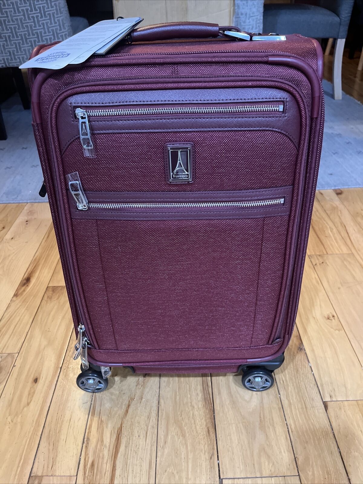 Elite 8-Wheel Softside Spinner Carry-On Luggage
