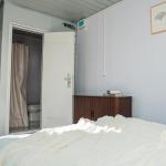 Modern 2-Story Container Tiny Home with Patio