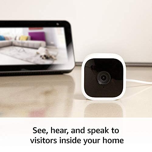 Blink Mini – Compact indoor plug-in smart security camera, 1080p HD video, night vision, motion detection, two-way audio, easy set up, Works with Alexa – 1 camera (White)
