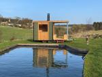 Outdoor Log-Fired Sauna Cabin on Wheels