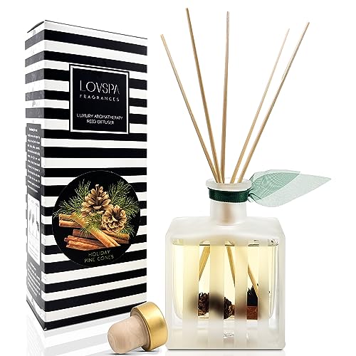 LOVSPA HOLIDAY CINNAMON PINE CONES Reed Diffuser Oil Gift Set | Fir Needles, Cinnamon Sticks, Clove Buds, Sandalwood & Cedarwood | Winter Scent | Modern Striped Glass Bottle | Made in The USA
