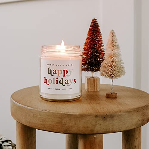 Sweet Water Decor Happy Holidays Soy Candle | Cinnamon, Trees, and Cloves Scented Candles for Home | 9oz Clear Jar, 40+ Hour Burn Time, Made in The USA | Christmas Candles for Home