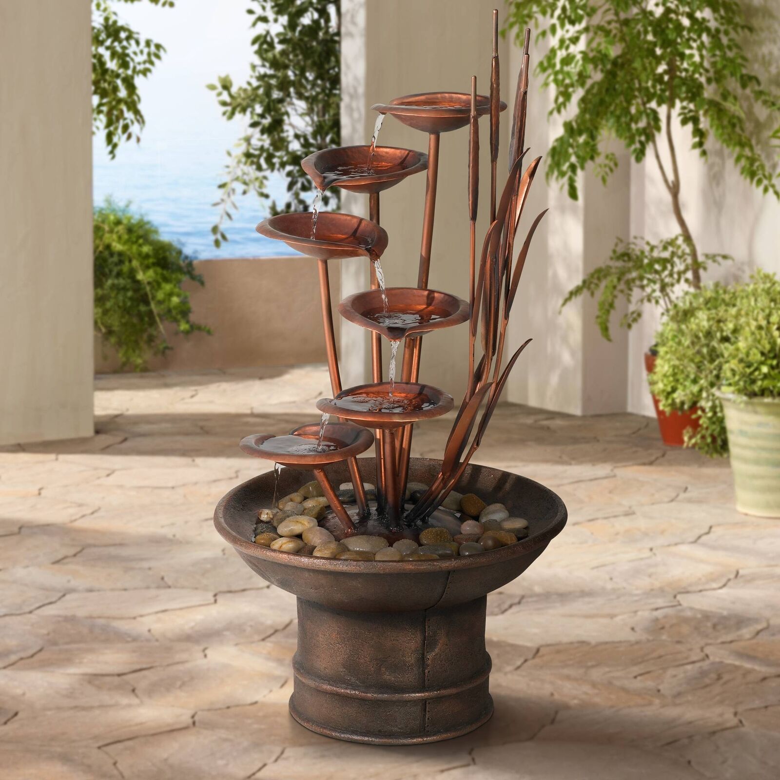Rustic Cascading Outdoor Fountain with Water Lilies and Cat Tails