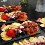 MOUYAT 8 Pack 10 x 5 Inch Black Slate Plates, Rectangular Slate Cheese Board with Natural Edge, Natural Stone Plates Cutting Board Charcuterie Boards for Cheese, Sushi, Meat, Appetizers