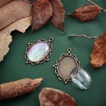 PH PandaHall 5pcs Pendant Tray Oval Charms Cabochon Bezel and 5pcs 40x30mm Glass Cabochon Dome Tiles Clear Cameo Memorial Photo Pendant for Bouquet Wedding Brides Graduation Charm