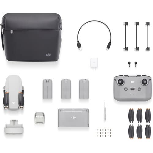 DJI Mini 2 Fly More Combo - Drone Quadcopter UAV - Ultralight and Foldable, with 12MP, 4K Camera, 31 Min Flight Time, (CP.MA.00000306.01) + 64GB Card + BackPack + Landing Pad + Cleaning Kit + More