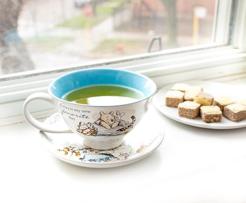 Silver Buffalo Disney Winnie the Pooh Walking Classic Scene Ceramic Teacup and Saucer, 12 Ounces