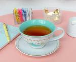 Silver Buffalo The Office Finer Things Club Tea Gold Foil Boxed Ceramic Teacup and Saucer, 12 Ounces