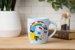 Silver Buffalo Sanrio Hello Kitty and Friends Featuring Badtz-Maru, My Melody, Cinnamoroll, Pompompurin, Tuxedo Sam, Keroppi, and Chococat Rainbow Jumbo Curved Ceramic Mug, 25 Ounces