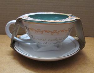 Silver Buffalo The Office Finer Things Club Tea Gold Foil Boxed Ceramic Teacup and Saucer, 12 Ounces