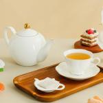 Elegant White Ceramic Tea Cup and Saucer Set